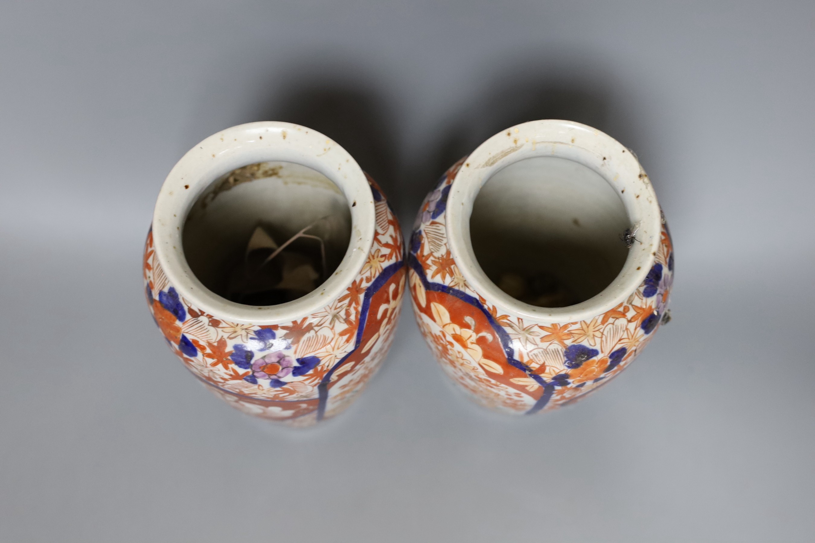 A 19th century Imari lobed dish and a pair of Imari vases, tallest 21cm